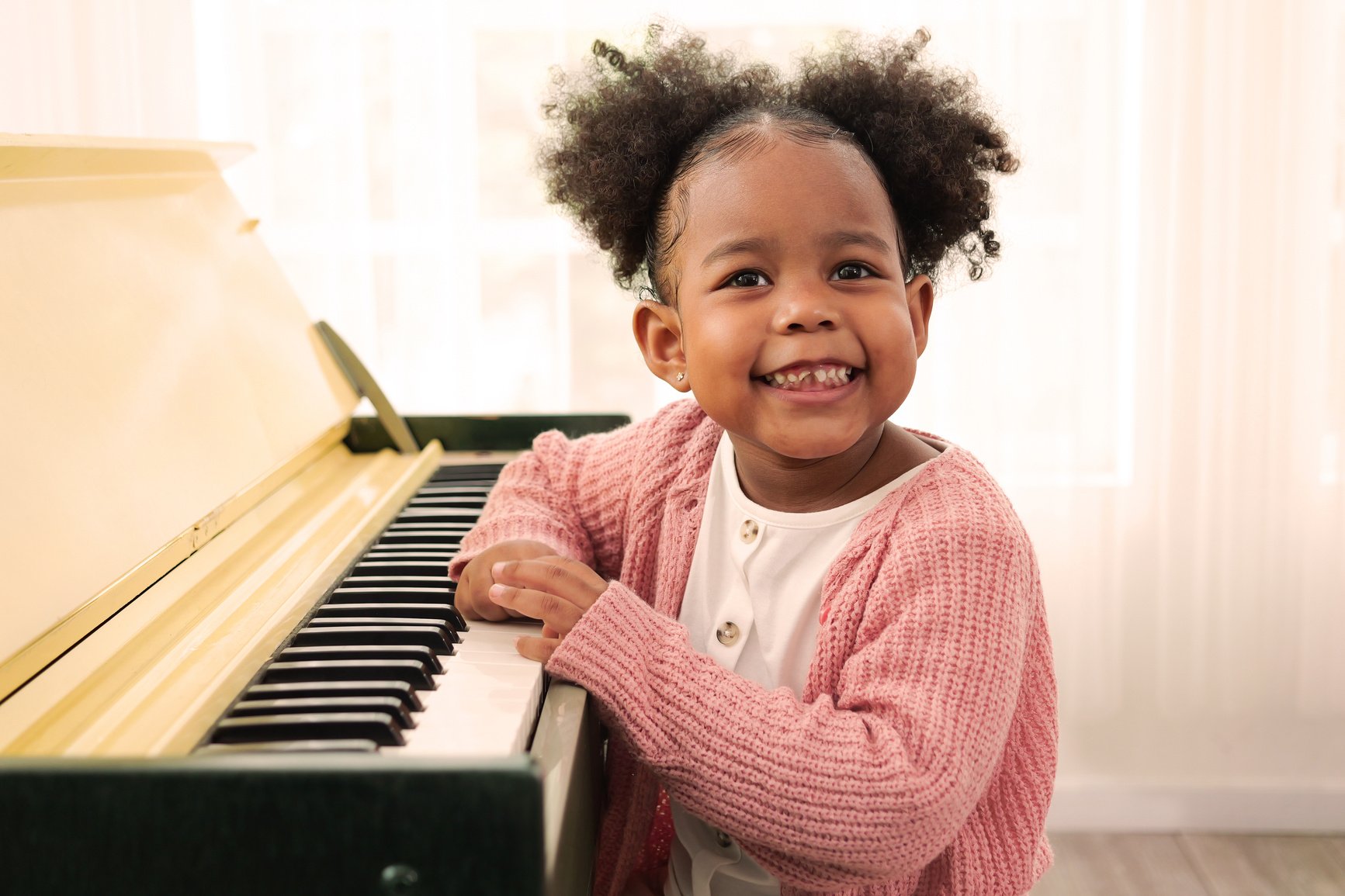 Kid playing piano, Daughter in piano class, Happy kid playing piano